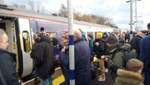 Crowds boarding a train at Ashington station